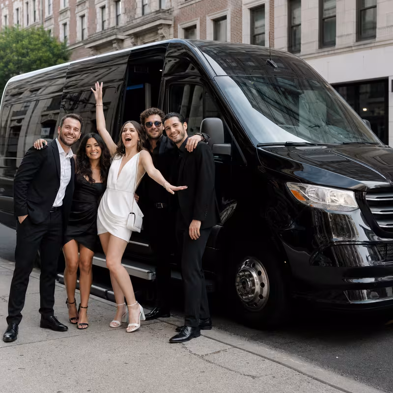Group boarding a white charter bus for Bachelor & Bachelorette Transportation transportation in Elizabeth