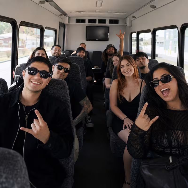 Party bus interior with wraparound leather seating and LED lighting in Elizabeth
