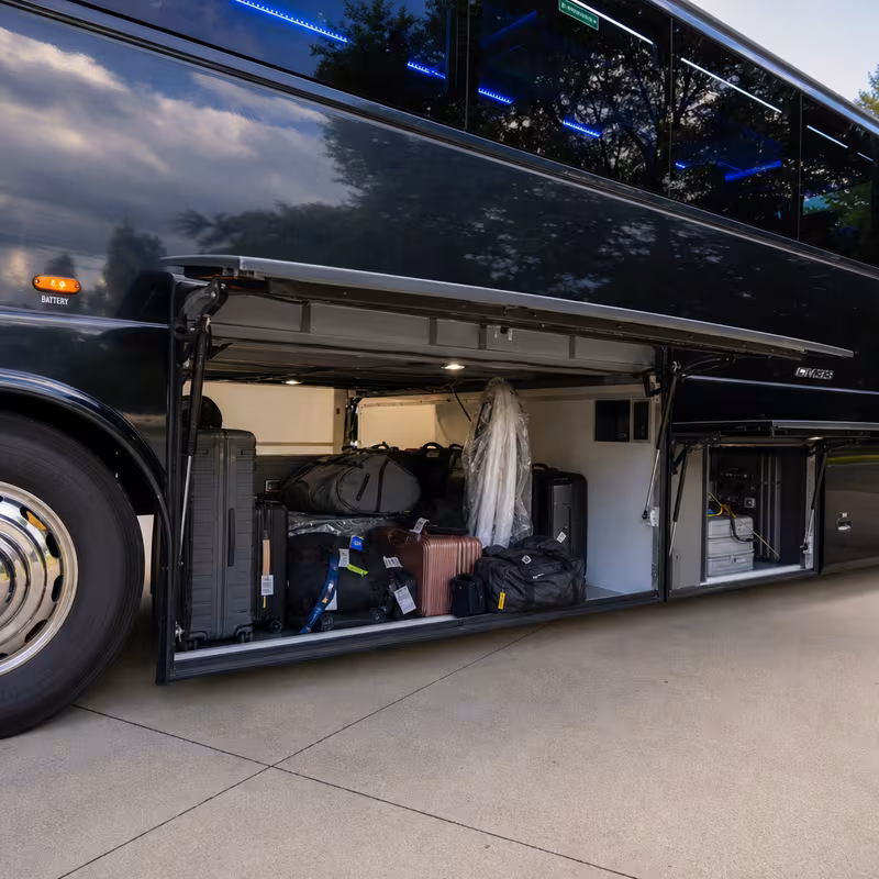 Party bus interior with wraparound leather seating and LED lighting in Elizabeth